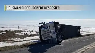 Strong winds topple semis