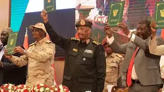 Sudan coup leader urges troops to back democratic transition