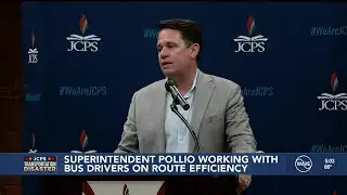 Superintendent Pollio working with bus drivers on route efficiency