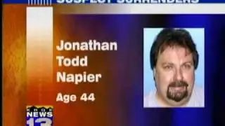 Suspect surrenders after TV news report