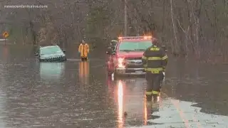 SUV gets stuck in water in Milford