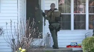 SWAT officers serve warrant, take 1 into custody