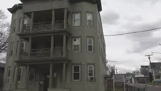 Tenant taken into custody after Manchester rooming house fire displaces 17