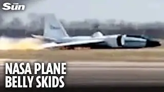 Terrifying moment NASA plane ERUPTS into flames as it touches down without landing gear