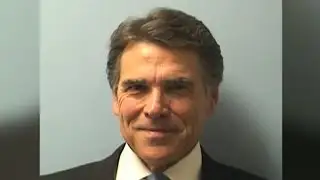 Texas Gov. Perry turns himself in, vows to fight
