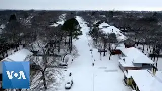 Texas Suburb Blanketed in Snow After Winter Storm