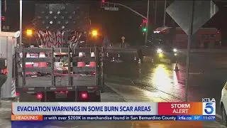 Thousands under evacuation warning as storm hits Southern California