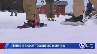 Three generations of skiers hit the slopes despite mild weather