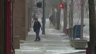 Toledo residents navigate Ice on Sidewalks