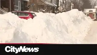 Toronto crews begin focusing on snow removal following record storm