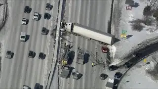 Tractor-trailer crash blocking Route 128