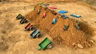 Tractors got stuck in a rocky area and were pulled out and sent back with soil.