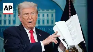 Trump throws his stack of accomplishments on the floor during press briefing
