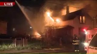Two firefighters injured battling vacant house fire