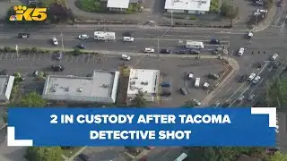 Two in custody after Tacoma detective shot