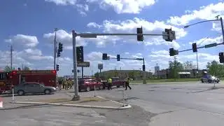 Two-vehicle crash snarls traffic at busy intersection