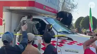 U-Haul plows through Los Angeles crowd supporting Iran protest; driver swarmed by protesters after