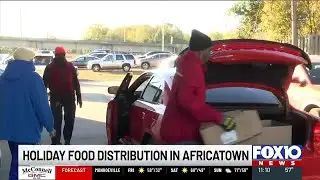 United Way, TruBridge distribute holiday food boxes in Africatown