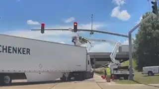 Utility worker hit by 18-wheeler while working on traffic light