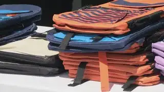 Verizon retailers host backpack giveaway for local families