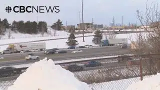 Video shows car flying off overpass onto Highway 401