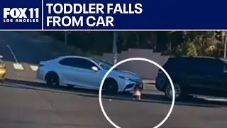 Video shows toddler falling from moving vehicle
