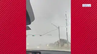 Viewer captures trees swaying, debris flying as afternoon storms hit Cypress area