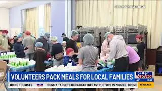 Volunteers Pack Meals for Local Families