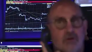 Wall St ends lower as bank CEOs warn of possible pullback | REUTERS