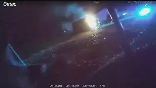 WATCH: Local police officers help save driver from car fire