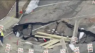 Water returns to residents after large sinkhole forms due to water main break
