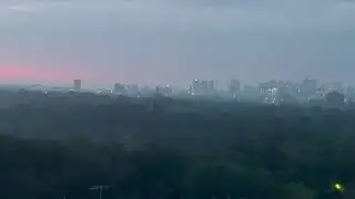 Wildfire Smoke and Clouds Create a Hazy Scene Over Boston