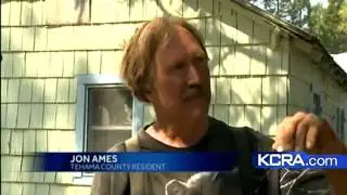 Wind pushes wildfire toward homes