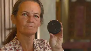 Woman asks for change after being struck by puck during hockey game