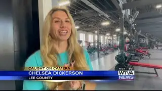 Woman reacts to lightning strike