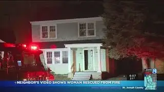 Woman rescued from house fire in GR