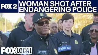 Woman shot after threatening Detroit officer