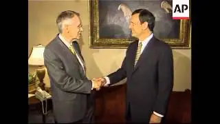 WRAP Bush with nominee John G. Roberts, adds protests